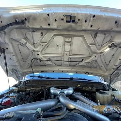 Engine bay before cleanup.